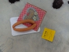 Detail: Animal in its perfect form (Frankfurter on napkin "Homeland" and typical cardboard plate).
